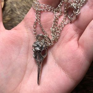 Silver toned bird skull necklace